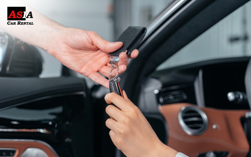 Car keys being handed over