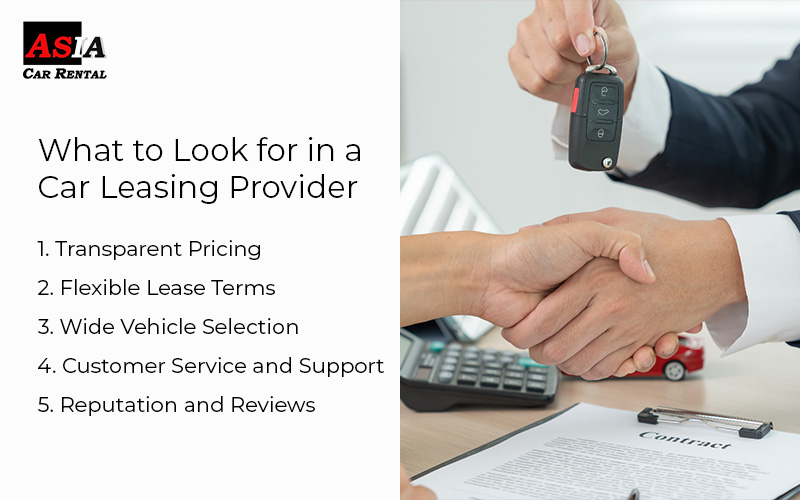 Two people shaking hands after discussing car leasing and rental options