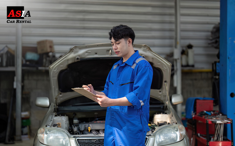 mechanic checking the car