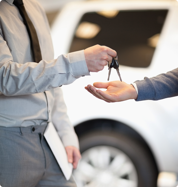 salesman-handing-keys-customer